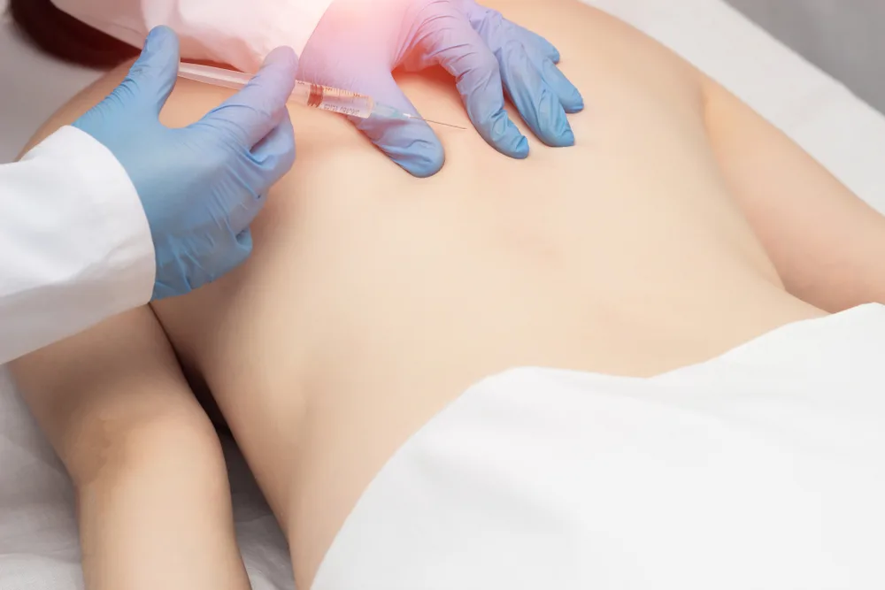Trigger point injection into a patient's muscle